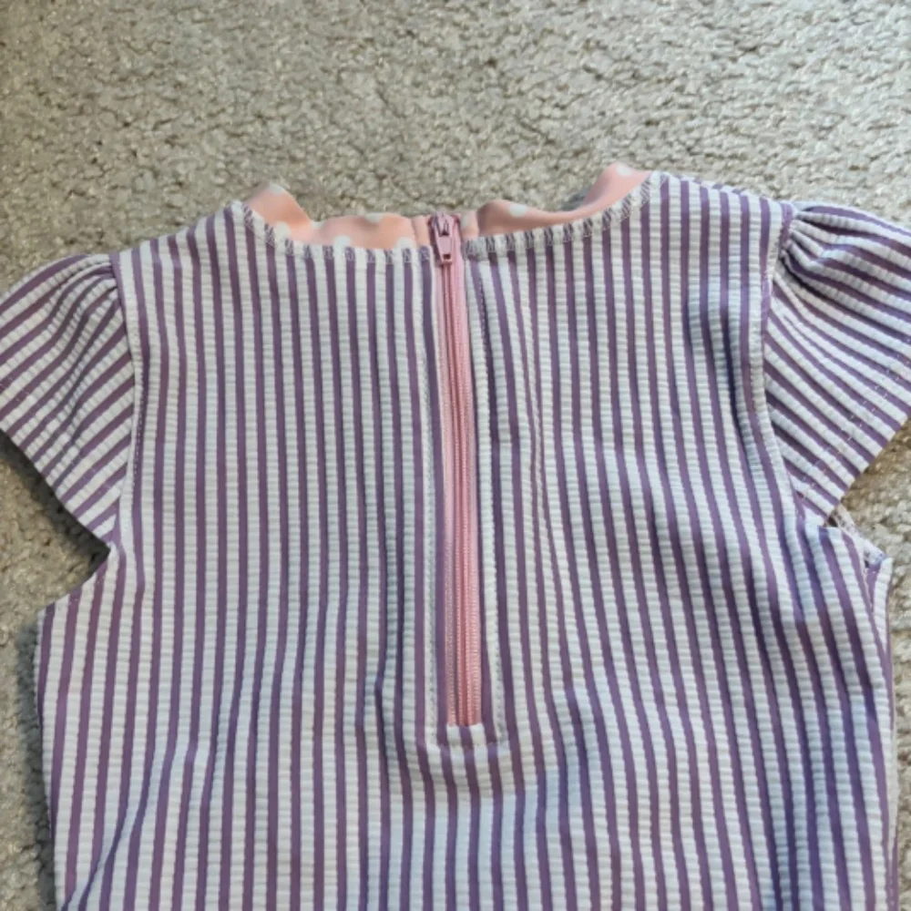 RuffleButts Toddler One-Piece Swimsuit Purple Stripe Peplum Size 2T